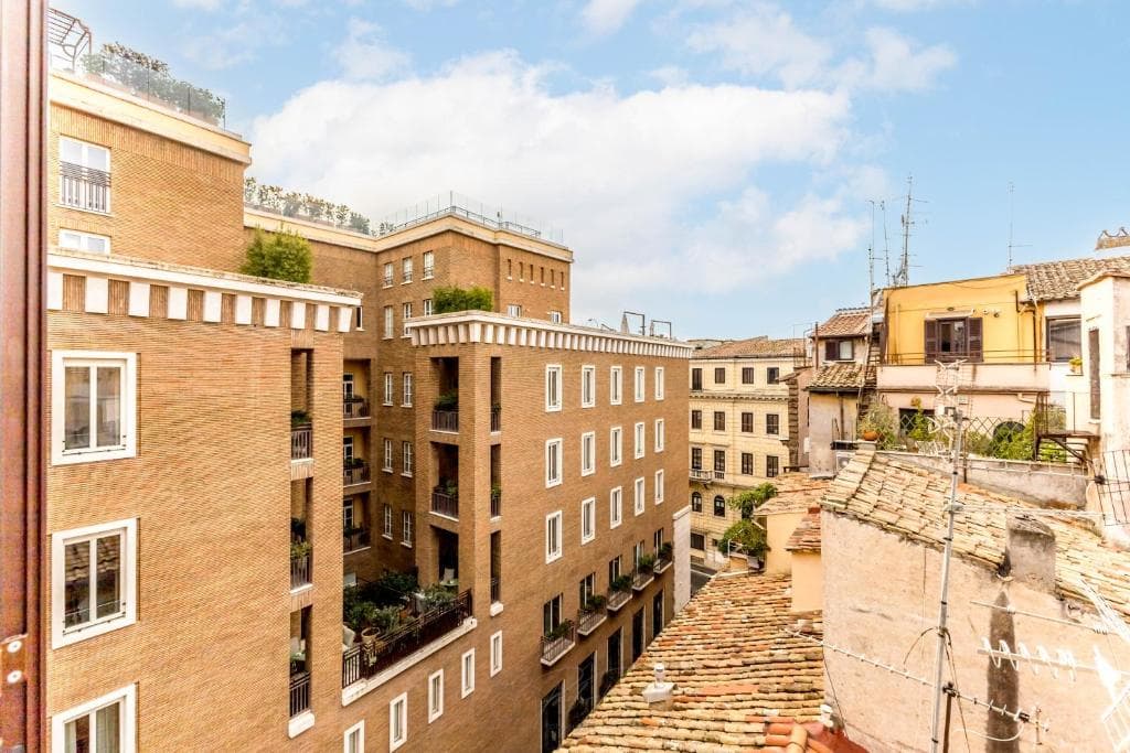 Historic palazzi and rooftops seen from the apartment window